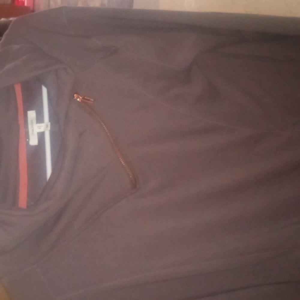 Purple hoodie is a medium in women's